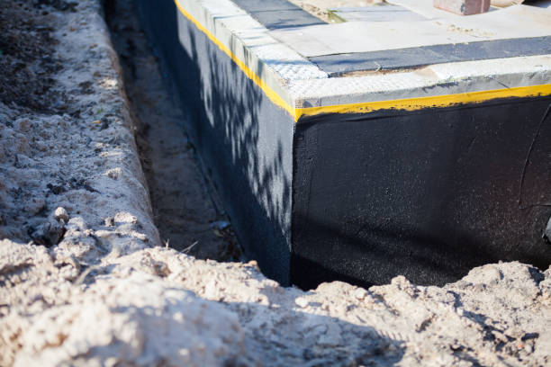 Professional Basement Waterproofing technician working in Yacolt, WA